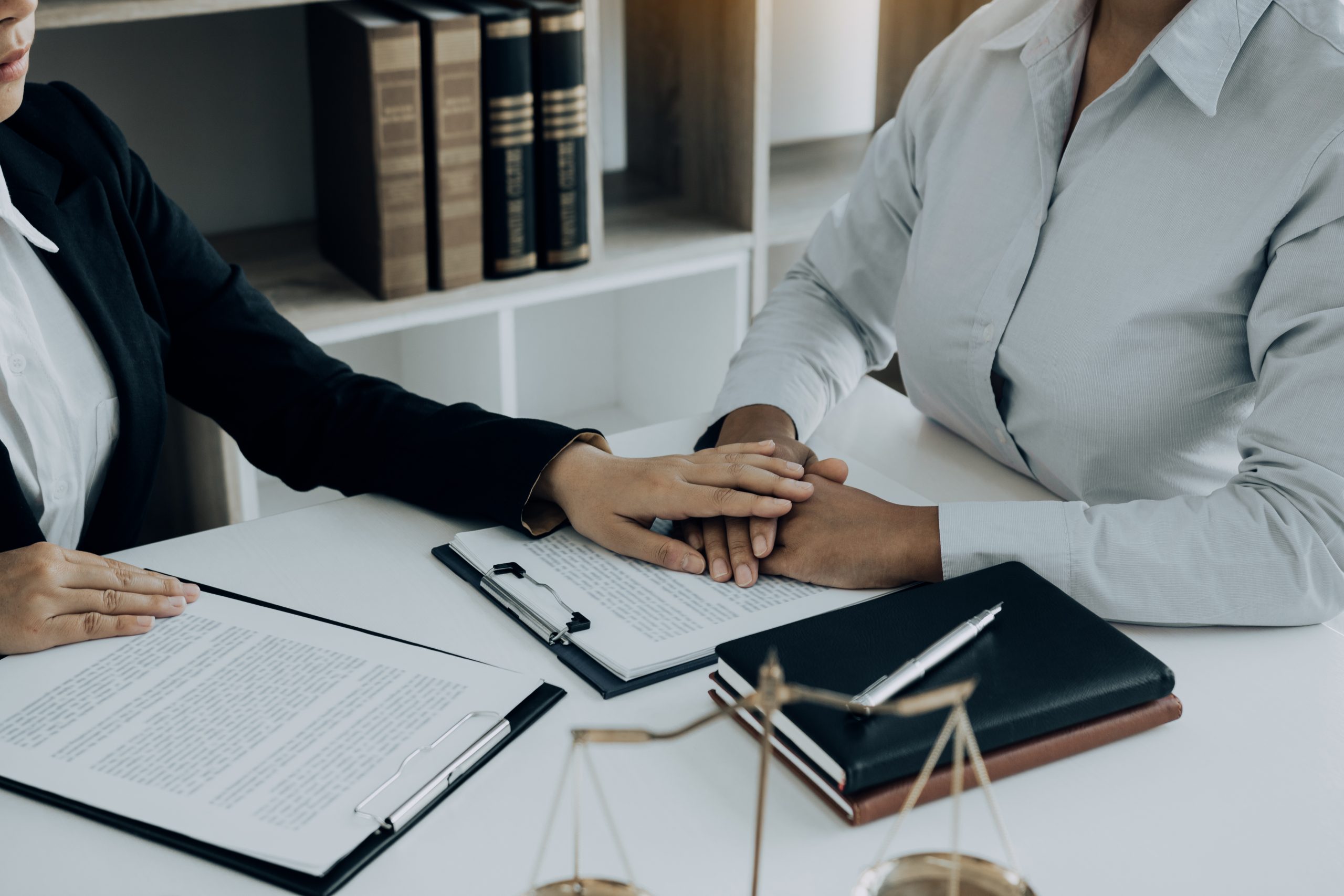 lawyer-is-counseling-the-client-in-his-counsel-and-2022-10-06-05-58-00-utc-scaled-1